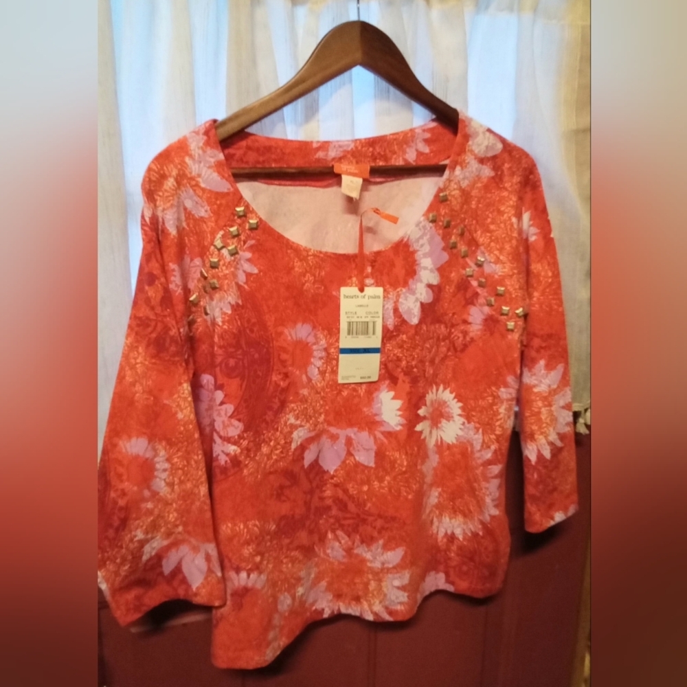 hearts of palm coral orange floral scoop neck top with stud accents